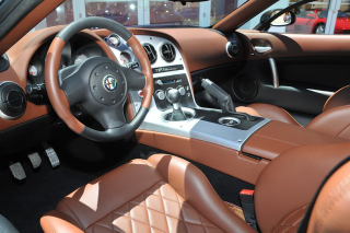 Illustration for article titled This Viper-Based Alfa Romeo Is Gloriously Brown And Yours For $700,000